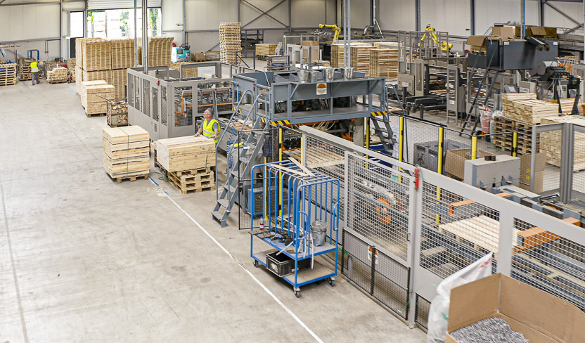 A modern wooden pallet production line speeds up production